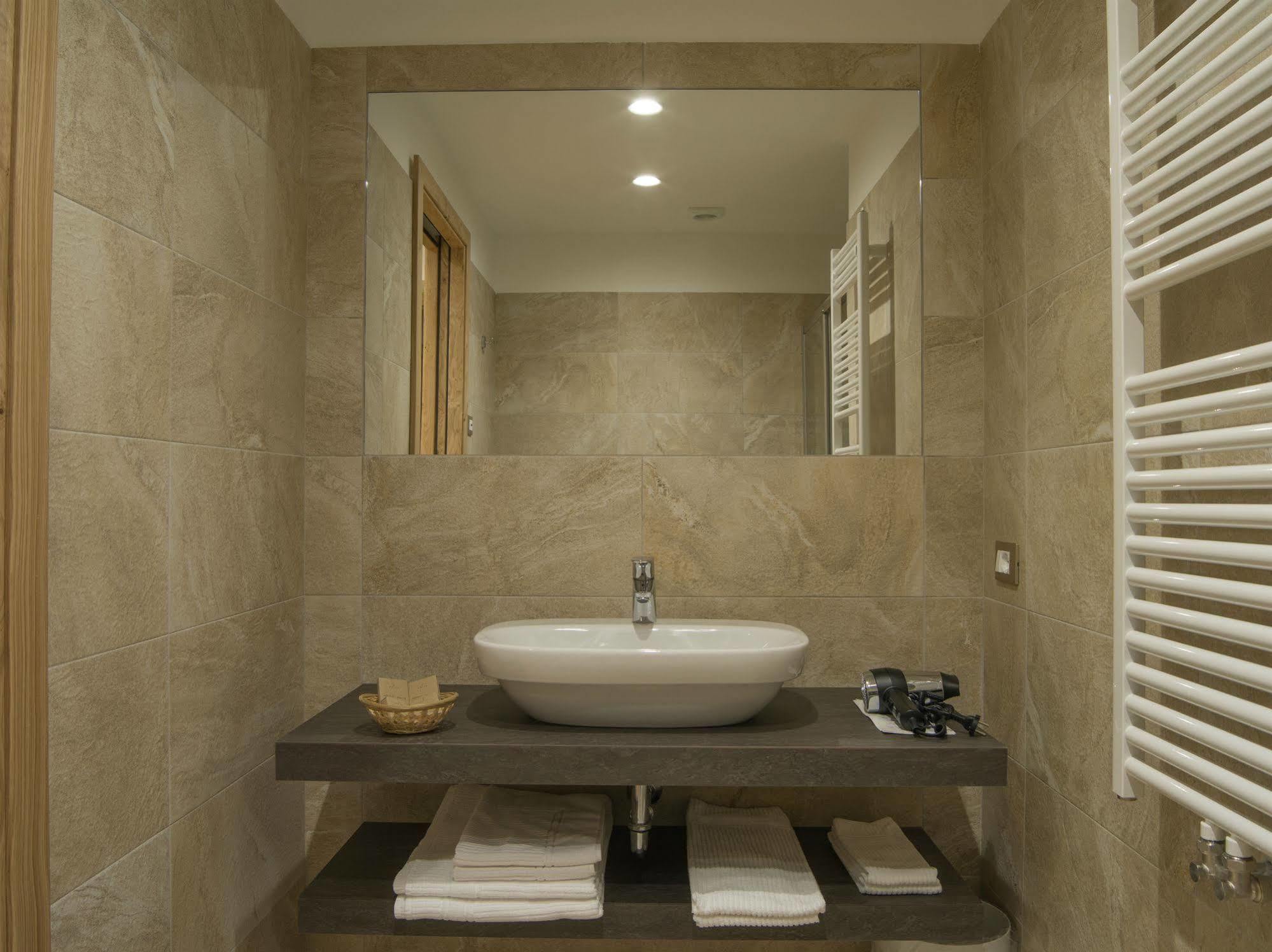 Hotel Garni Caminetto 4*